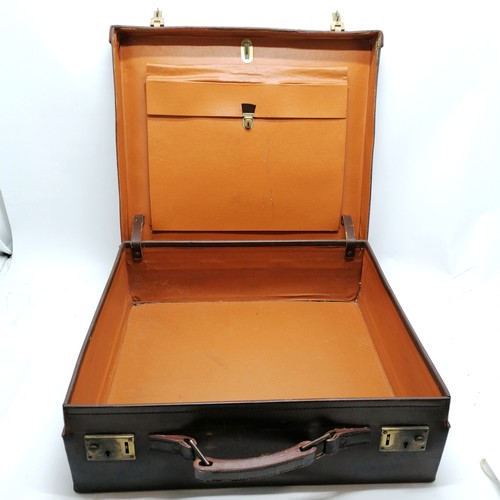 133 - Vintage brown leather unusual suitcase with brass fittings - 52cm x 45cm x 16.5cm deep and has 2 bra... 