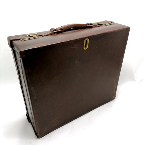 133 - Vintage brown leather unusual suitcase with brass fittings - 52cm x 45cm x 16.5cm deep and has 2 bra... 