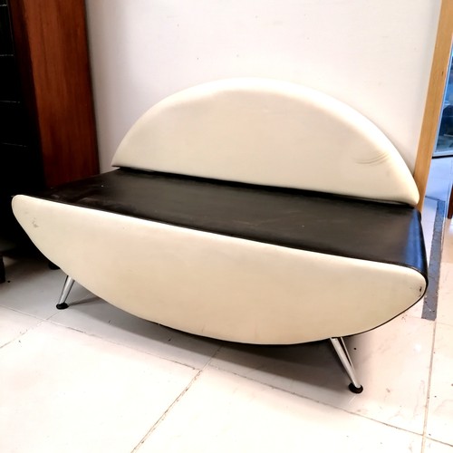 150 - Retro style cream and black vinyl seat with sputnik legs and open ended with rounded back - 122cm lo... 