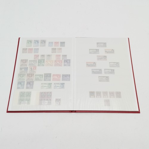 245 - Red stockbook with 400 x mint / unused QV to QEII stamps / part sets etc