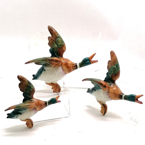 252 - 3 x Beswick flying ducks / mallards wall ornaments - largest 22cm across ~ middle bird has repair to... 