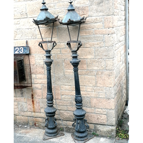 3 - Pair of cast iron street lamps with copper topped lanterns - missing their glass - 187cm high