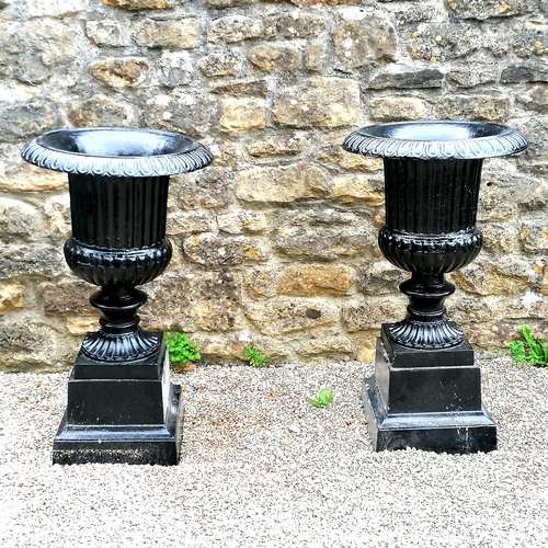 5 - Large pair of black cast iron fluted urns on stands - 36cm diameter base x 98cm high