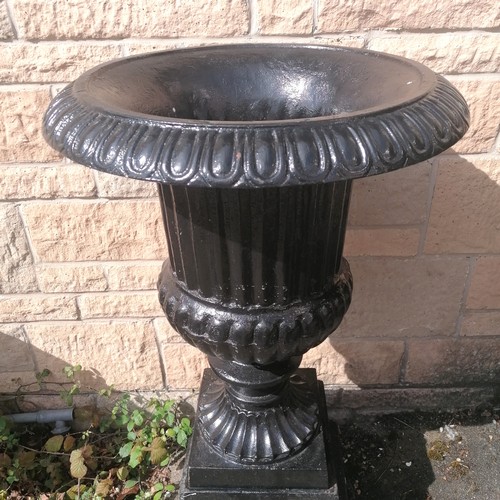 5 - Large pair of black cast iron fluted urns on stands - 36cm diameter base x 98cm high