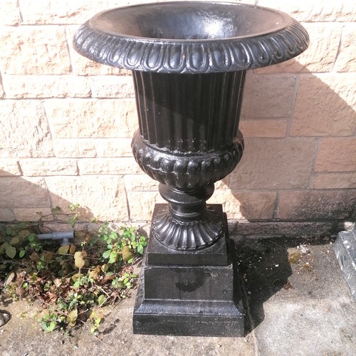 5 - Large pair of black cast iron fluted urns on stands - 36cm diameter base x 98cm high