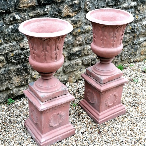 8 - Pair of pedestal urns with acanthus leaf detail on square pedestal bases with wreath detailing - in ... 