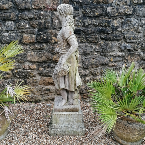 13 - Figure of a woman holding grapes on a square pedestal base - 140cm high x 40cm diameter