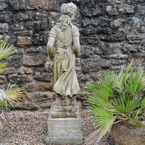 13 - Figure of a woman holding grapes on a square pedestal base - 140cm high x 40cm diameter