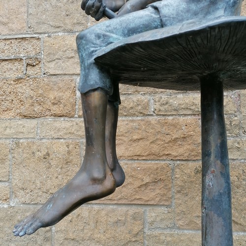 32 - Large scale bronze sculpture of a pixie seated on a mushroom - total height 160cm