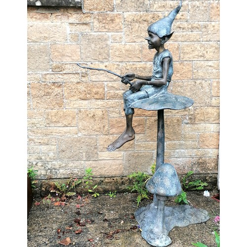 32 - Large scale bronze sculpture of a pixie seated on a mushroom - total height 160cm