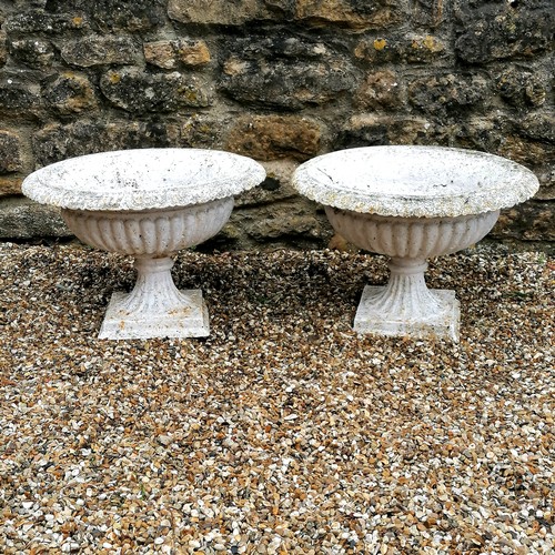 44 - Antique pair of cast iron fluted pedestal urns - in good used condition - 56cm diameter x 36cm high