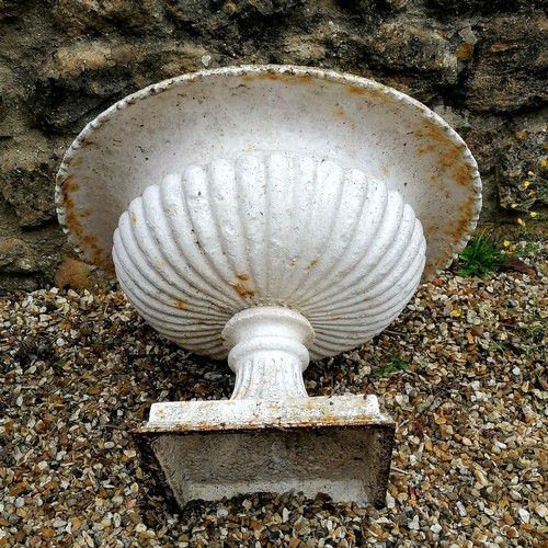 44 - Antique pair of cast iron fluted pedestal urns - in good used condition - 56cm diameter x 36cm high