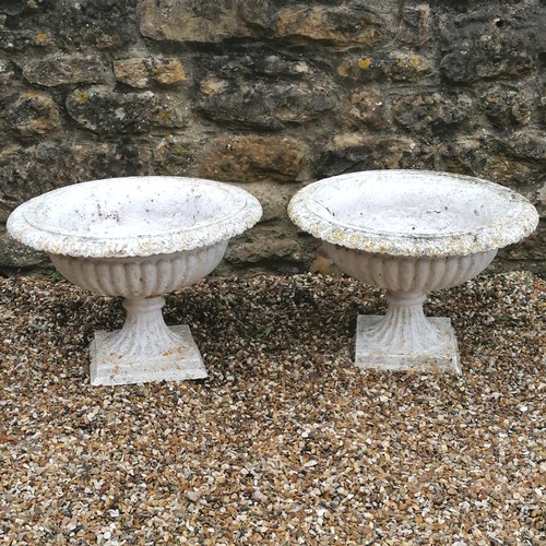 44 - Antique pair of cast iron fluted pedestal urns - in good used condition - 56cm diameter x 36cm high