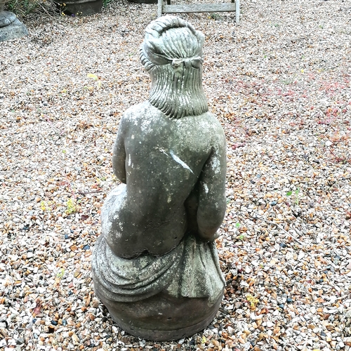 52 - Figure if a woman seated on a rock - 58cm high