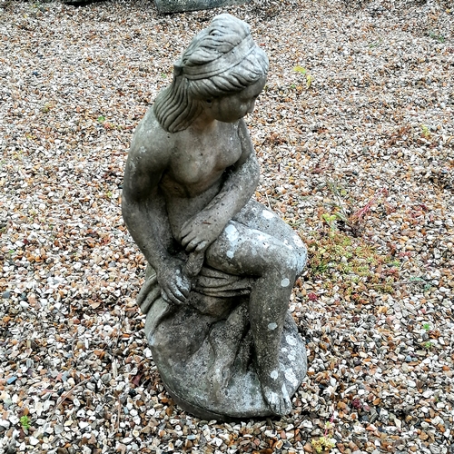 52 - Figure if a woman seated on a rock - 58cm high