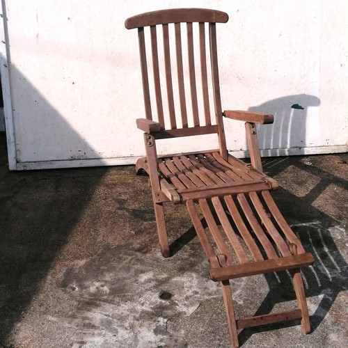 70 - 2 teak sun loungers with brass mounts (1 has wheels) T/W a teak folding chair - 106cm long x 91cm hi... 