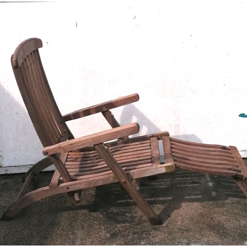 70 - 2 teak sun loungers with brass mounts (1 has wheels) T/W a teak folding chair - 106cm long x 91cm hi... 