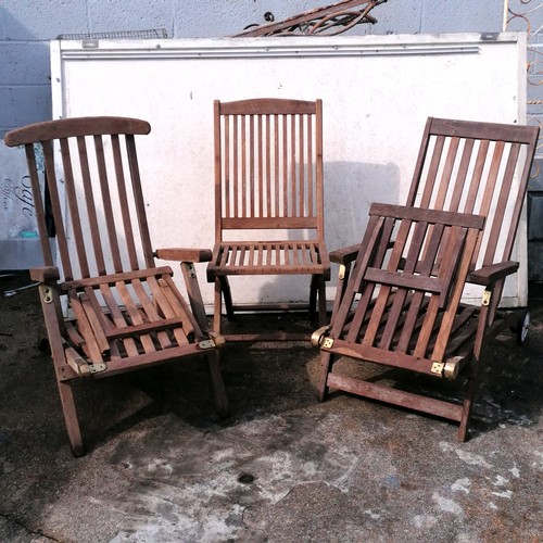 70 - 2 teak sun loungers with brass mounts (1 has wheels) T/W a teak folding chair - 106cm long x 91cm hi... 