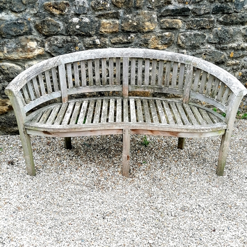 77 - Curved teak 3 seater garden bench T/W blue seat cushion - 160cm long x 55cm deep x 83cm high. In goo... 