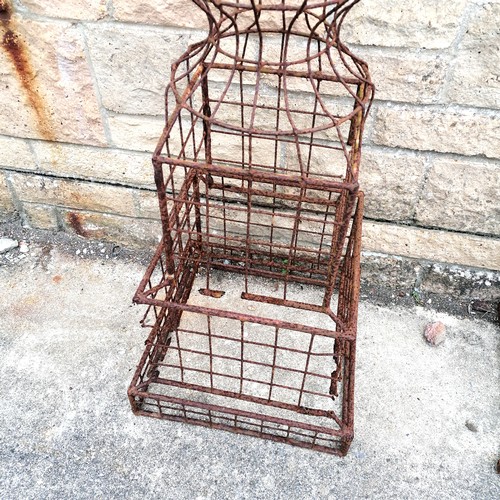 81 - Pair of wirework obelisks - has obvious damage to both