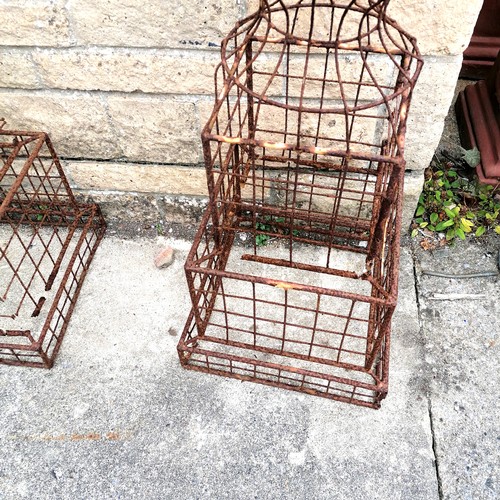 81 - Pair of wirework obelisks - has obvious damage to both