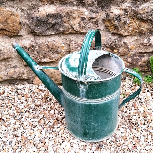 94 - 2 green painted watering cans without their roses - 40cm high