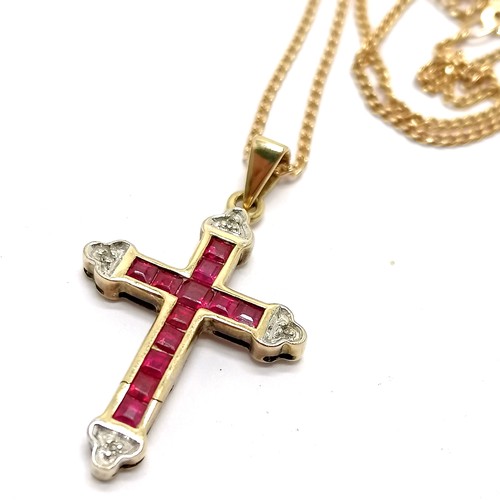 503 - 9ct hallmarked gold ruby & diamond set cross pendant (2.8cm) on UnoAErre 9ct hallmarked gold 62cm ch... 