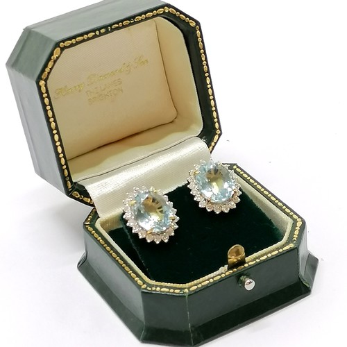 508 - 18ct marked gold aquamarine & diamond cluster earrings - stones approx 12mm x 10mm & total weight 9.... 