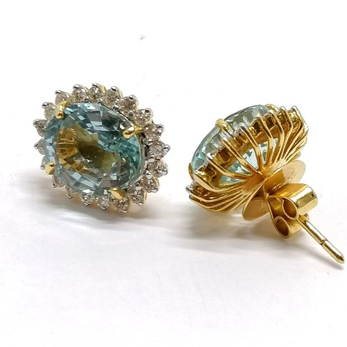 508 - 18ct marked gold aquamarine & diamond cluster earrings - stones approx 12mm x 10mm & total weight 9.... 