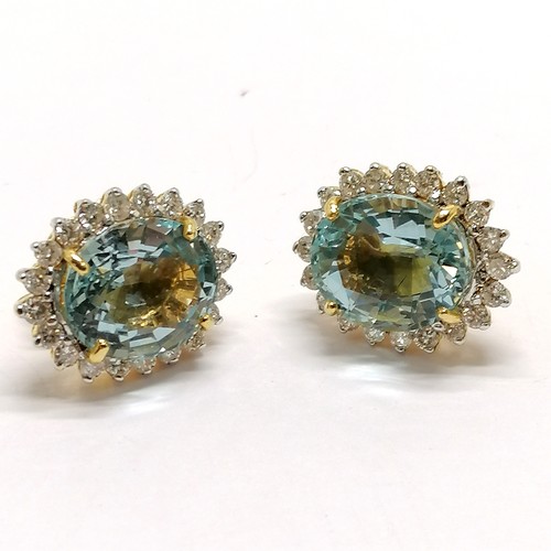 508 - 18ct marked gold aquamarine & diamond cluster earrings - stones approx 12mm x 10mm & total weight 9.... 