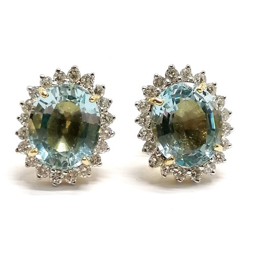 508 - 18ct marked gold aquamarine & diamond cluster earrings - stones approx 12mm x 10mm & total weight 9.... 