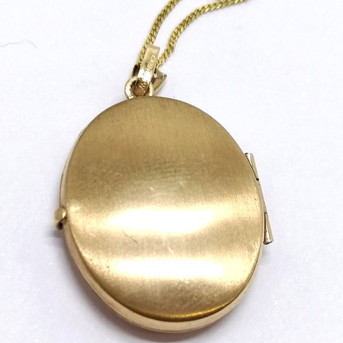 583 - 9ct hallmarked gold locket pendant on a 9ct marked gold 44cm chain - total weight 2.7g - SOLD ON BEH... 