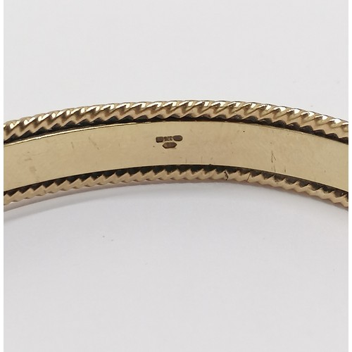 599 - 9ct hallmarked gold heavy gauge bangle with catch - 6.5cm across & 27g - SOLD ON BEHALF OF THE NEW B... 