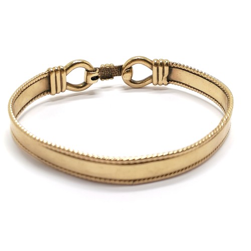 599 - 9ct hallmarked gold heavy gauge bangle with catch - 6.5cm across & 27g - SOLD ON BEHALF OF THE NEW B... 