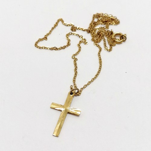 608 - 9ct hallmarked gold cross pendant on 9ct marked gold 44cm chain - 1.5g