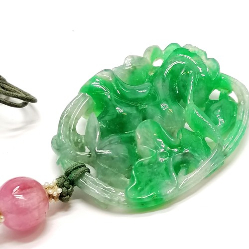 620 - Chinese hand carved green jade pendant with pierced flower / fruit detail with a pink jade bead - pe... 