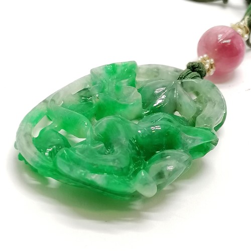 620 - Chinese hand carved green jade pendant with pierced flower / fruit detail with a pink jade bead - pe... 