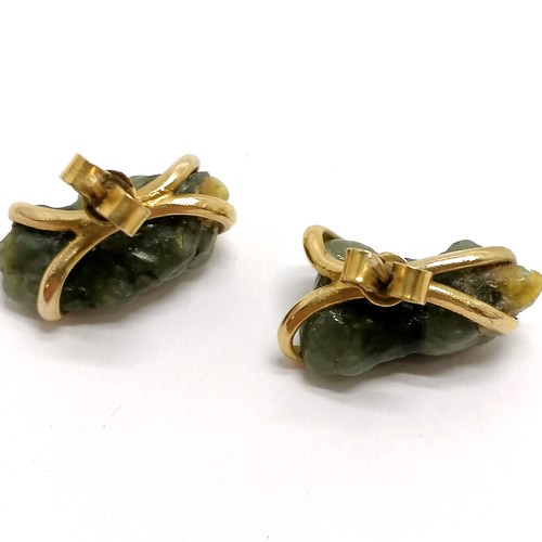 629 - Indistinctly marked gold earrings set with jade t/w gold mounted maori jade pendant & jade bar brooc... 