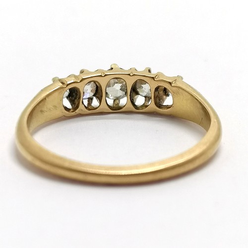 649 - 18ct marked gold 5 stone diamond ring - size L½ & 2.6g total weight