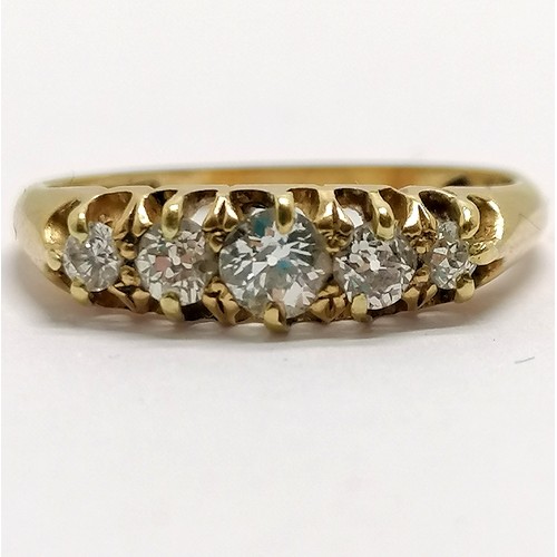 649 - 18ct marked gold 5 stone diamond ring - size L½ & 2.6g total weight