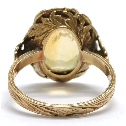 653 - Antique continental unmarked gold (touch tests as 18ct) fancy citrine ring with laurel leaf mount / ... 