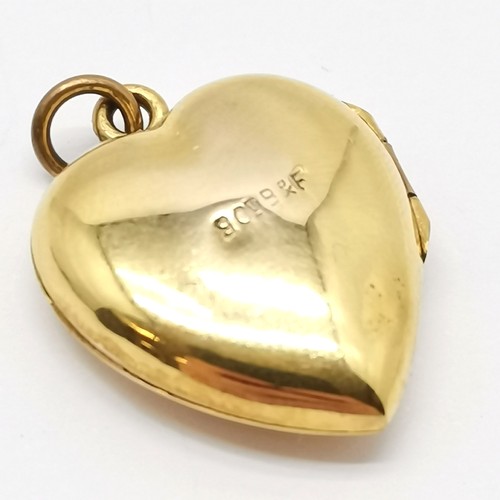 660 - 9ct front & back heart shaped pendant locket with engraved detail to front - 2.5cm drop & 2.6g total... 