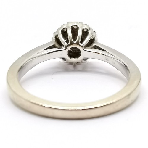 676 - 18ct hallmarked white gold diamond target cluster ring - size N½ & 4.5g total weight