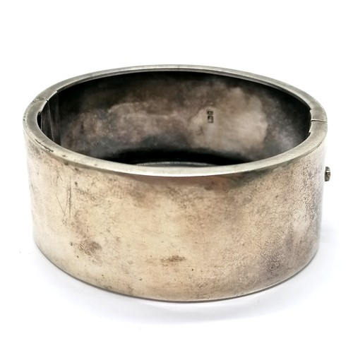 684 - 1882 antique silver hallmarked bangle with engraved & raised detail to front - 6cm across & 32g ~ ha... 