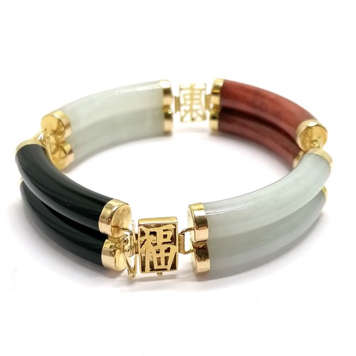 687 - 14ct hallmarked gold hardstone bangle (inc jade) - 37.8g total weight