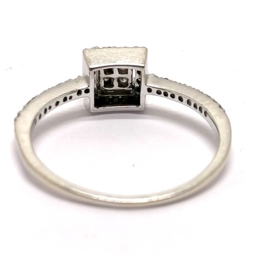 694 - 14ct marked white gold multi diamond cluster set (inc 4 princess cut) & with diamond set shoulders -... 