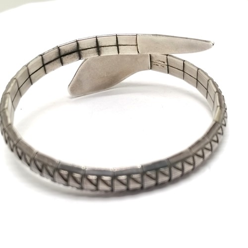 716 - Sterling silver snake sprung bangle by K&L - 27g