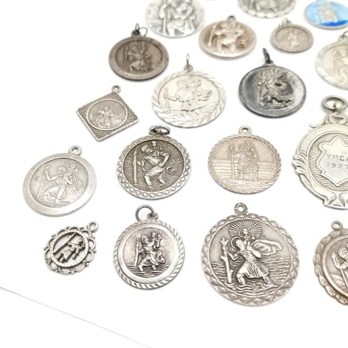 730 - Qty of silver St Christopher medallions / pendants inc enamel Georg Jensen etc ~ total weight (lot) ... 