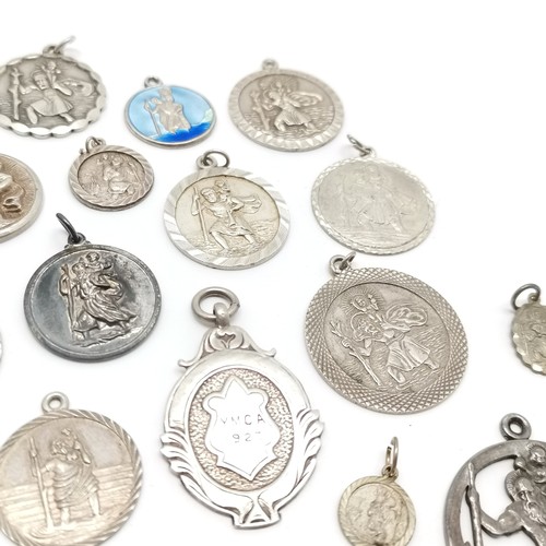 730 - Qty of silver St Christopher medallions / pendants inc enamel Georg Jensen etc ~ total weight (lot) ... 