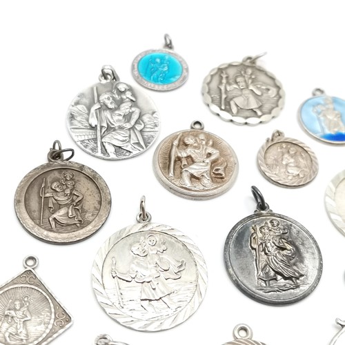 730 - Qty of silver St Christopher medallions / pendants inc enamel Georg Jensen etc ~ total weight (lot) ... 